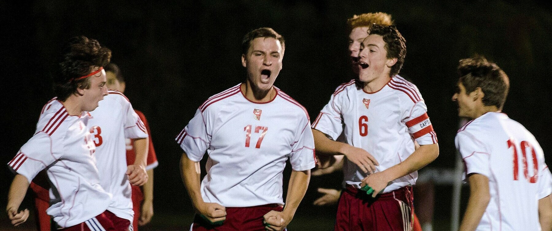 men's soccer team celebrating